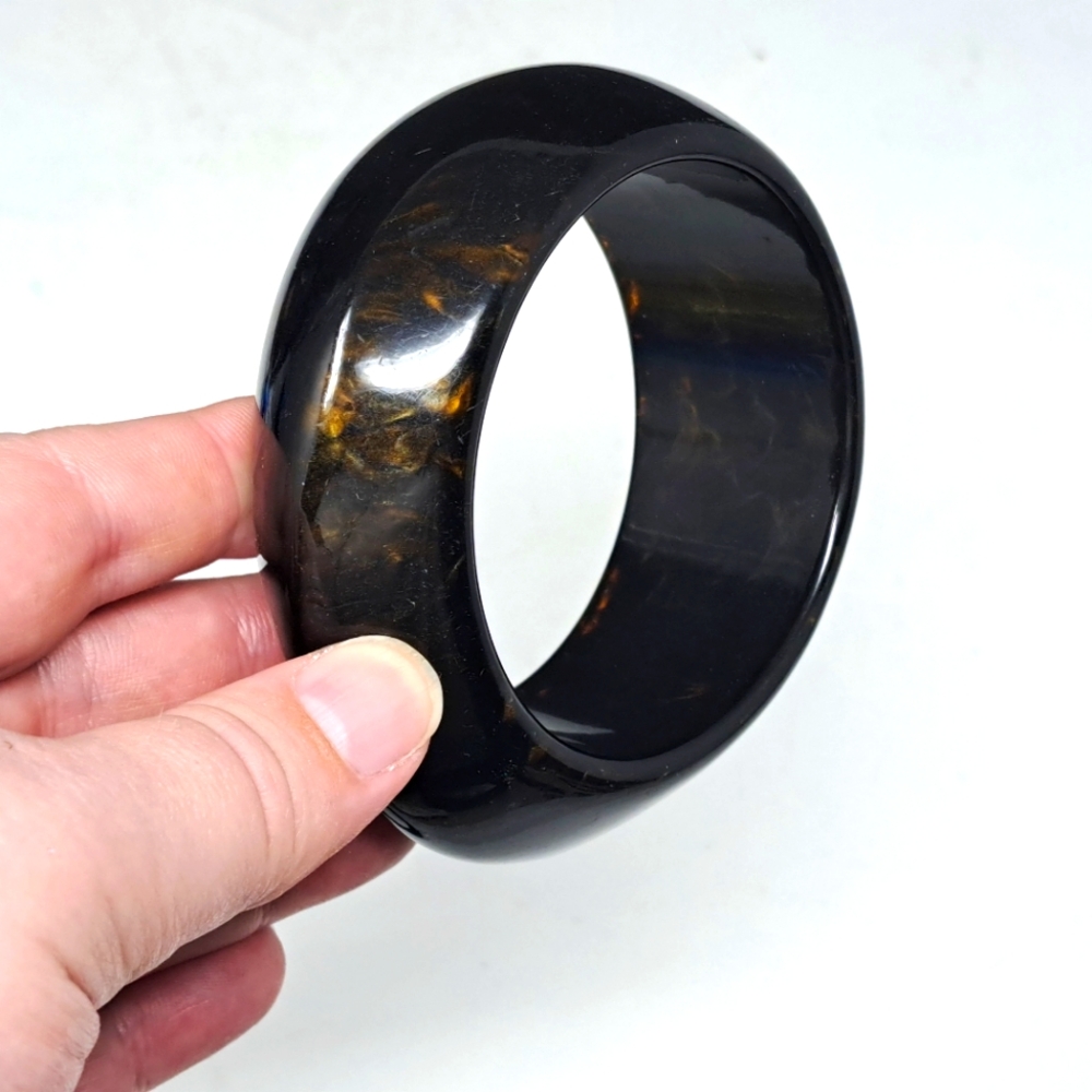 Dark Fashion Bangle With Swirled Amber Color